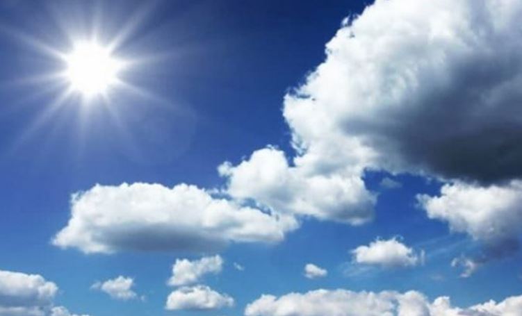 Moti me diell dhe vranësira të pjesëshme